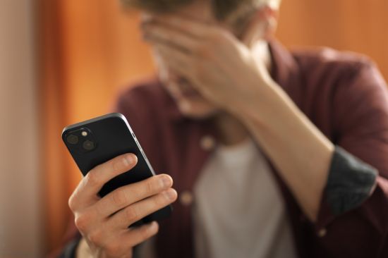 medium shot suffering teenager being cyberbullied